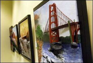 A mixed media piece made by a prisoner named Radar Varner in the lobby of The Federal Public Defender's office.