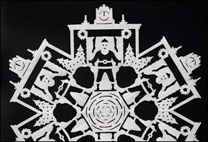 A snowflake on display made by Dr. Thomas Clark, a retired physician from the University of Michigan, who is know as 