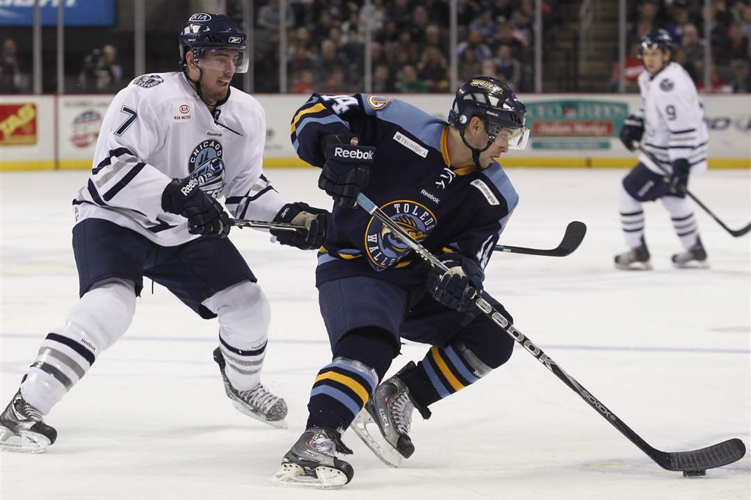 Walleyes-Kyle-Rogers-fends-off-Chicago-s-Aaron-Marvin