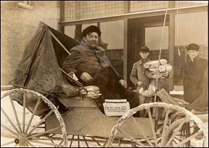 Charles Kent, a Rural Free Delivery carrier for Route 7, prepares to take mail to northwest Ohio's rural families in this undated photo. The Rural Free Delivery system revolutionized postal service for farm families, allowing delivery of 