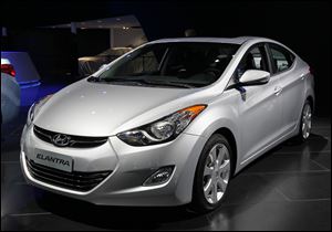 Hyundai's Elantra is the winner of the Car of the Year award at the North American International Auto Show. Land Rover's Range Rover Evoque is Truck of the Year. 