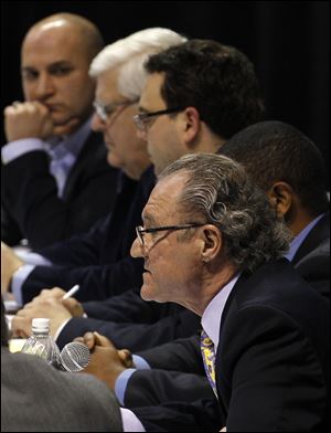Ohio State Representative Robert F. Hagan, front, speaks during the community forum on injection wells in Youngstown.