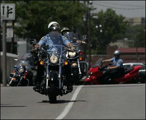 Officials say motorcycles could respond to crimes, help
control traffic, and accompany funerals and parades.