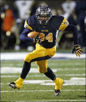 Whitmer 's Jody Webb, shown here against  Wadsworth during the 2011 Division I regional championship football game, has committed to the University of Toledo.