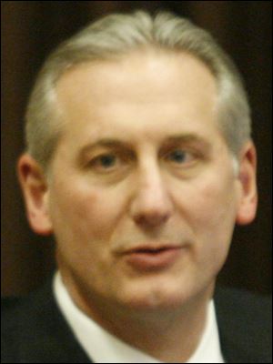 Dan Romano, ex-TPS treasurer, says the board built the delayed savings into projections and believes the target will be reached.