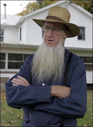 Amish sect leader Sam Mullet is jailed awaiting a March trial on hate crimes.