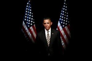 President Barack Obama pauses before shaking hands at a campaign event Thursday at the Apollo Theatre in the Harlem neighborhood of New York. 