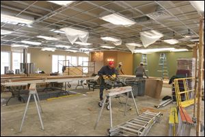 About 400 volunteers from as far away as ansfield, Ohio, and Indiana have been working on the project since November. All volunteers are required to complete a worker-safety training program.