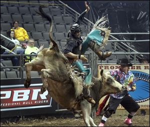Jimmy Anderson, of Bayfield, Colo., rides Stormin Normin. 