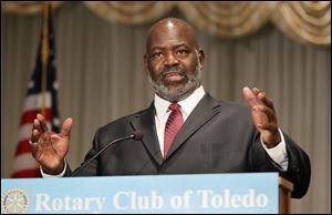 Toledo Mayor Mike Bell delivers the 2012 State of the City address during a Rotary Club of Toledo meeting at the Park Inn in Toledo.