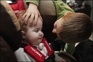 Logan Tenney welcomes home his baby brother Caysen. Caysen has undergone more than 20 surgeries to connect his esophagus to his stomach, but he still has a hole in his heart and significant hearing loss.