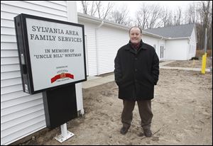 Jason Robertson, executive director of Sylvania Area Family Services, says the 5,000-square-foot expansion now under construction is being built largely by labor donated by members of local trade unions. The goal of the brick sale is $30,000.