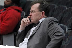 City law director Adam Loukx attends a council hearing on questionable bids and favoritism in the city's Department of Neighborhoods in this November, 2011, file photo.