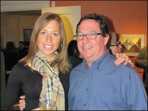 Alli McMaster, ticket chairman, with Dean Kasperzak, steering committee member and host of the party.
