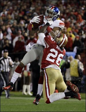 Former Wolverine Mario Manningham has 116 yards and three touchdowns in this year's playoffs for the Giants.
