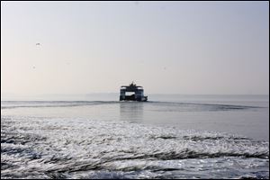 Miller Boat Line's ferry, William Market, departs from Catawba Point destined for South Bass Island last week, disrupting thin sheets of Lake Erie ice.
