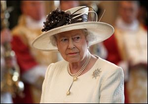 Britain's Queen Elizabeth II, shown attending a service marking the 400th anniversary of the King James Bible last year, rededicated herself to serving her country Monday, the 60th anniversary of her ascension to the throne.