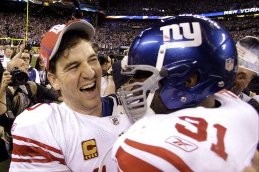 manning-and-aaron-hug-02-06-2012