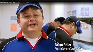 Brian Edler, Fremont, Ohio, Domino's franchisee, is shown on a video as Domino's presents the Parm Bread Bites item that Edler invented that is going to be sold by the company.