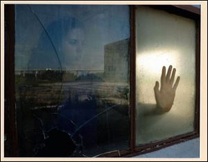 'On the Outside Looking In,' photograph by Dana Killam of St. Ursula Academy, is one of the artworks in the Ninth Congressional District Invitational Art Exhibition on display through Feb. 24 in the lobby of the Fifth Third Center in One Seagate in downtown Toledo.