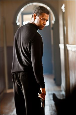 Denzel Washington plays disillusioned CIA veteran Tobin Frost  who has gone rogue in 'Safe House.'