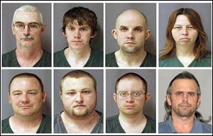 From top left, David Brian Stone Sr., 44, of Clayton, Mich,; David Brian Stone Jr. of Adrian, Mich,; Jacob Ward, 33, of Huron, Ohio; Tina Mae Stone and bottom row from left, Michael David Meeks,  40, of Manchester, Mich,; Kristopher T. Sickles, 27, of Sandusky, Ohio; Joshua John Clough, 28, of Blissfield, Mich.; and Thomas William Piatek, 46, of Whiting, Ind., suspects tied to Hutaree, a Christian militia.