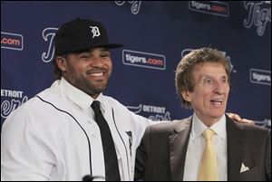 Prince Fielder stands next to Tigers owner Mike Ilitch after agreeing to a $214 million, nine-year contract. Ilitch is putting everything on the line to bring a championship to Detroit.