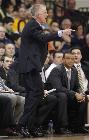 University of Toledo head coach Tod Kowalczyk shouts to his team during the second half Saturday.

