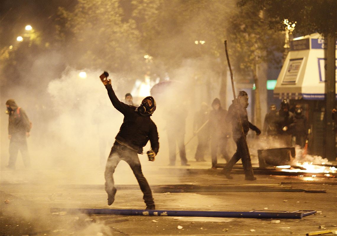 Greeks clean up damage after riots engulf Athens over new austerity deal | The Blade