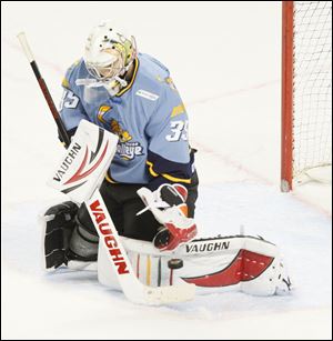 Walleye goalie Alec Richards makes a stop in the second period Sunday afternoon at the Huntington Center. Richards had 24 saves.