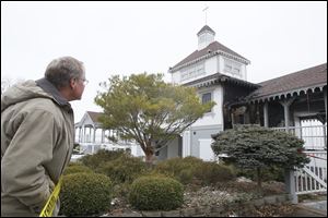Lakeside official Tom Derby views the pavilion, a hub of the Chatauqua community. The fire was discovered at 8:15 p.m. Tuesday. 
