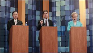 Candidates from left: Dennis Kucinich (D., Cleveland),Cleveland businessman Graham Veysey,  and U.S. Reps. Marcy Kaptur (D., Toledo) during the Ohio's newly drawn 9th Congressional District Toledo-area debate.