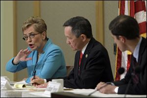 U.S. Rep. Marcy Kaptur, left, makes a point during a debate with U.S. Rep. Dennis Kucinich, center, and businessman Graham Veysey at the City Club in Cleveland Monday. The two sitting congressmen and outsider Mr. Veysey competed in a debate as they vie to win the Democratic primary for the new 9th District in northern Ohio. 