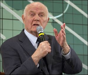 Former Sen. John Glenn answers a question at the Kennedy Space Center Friday in Cape Canaveral, Fla.