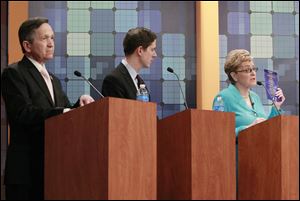 Candidates for Democratic nomination for the 9th Congressional District, U.S. Rep. Dennis Kucinich, left, Cleveland businessman Graham Veysey, and U.S. Rep. Marcy Kaptur of Toledo debate the issues in Toledo.