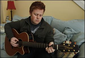 Temperance resident Sam DeArmond had a big interest in golf in high school and college, competing  on teams -- until a passion for music took over. He now performs regularly at area bars.