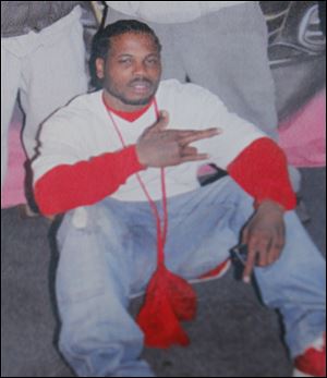Lamar Allen, who died allegedly holding the Express Carryout store on Mulberry St. in Toledo.