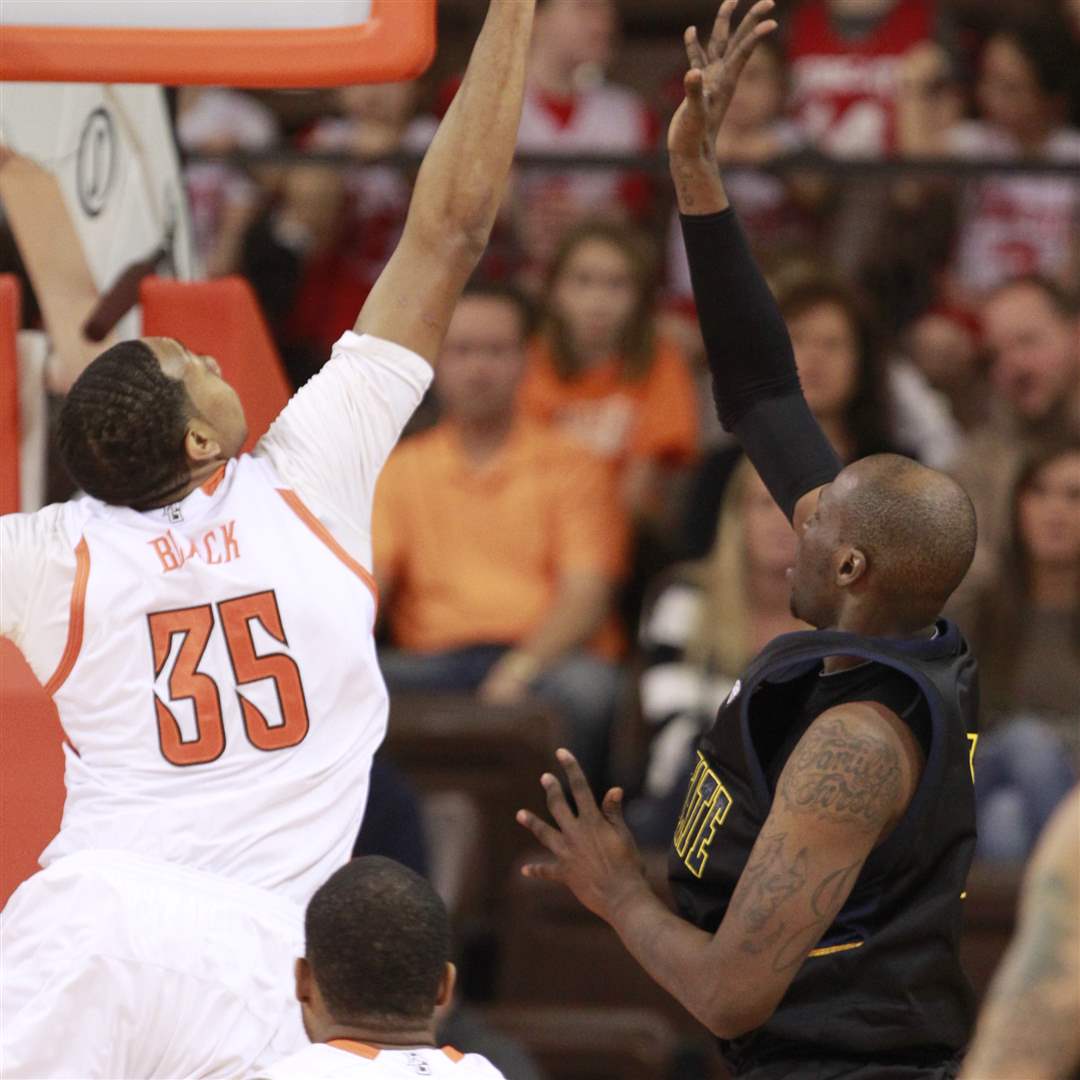 BGSU-s-Cameron-Black-blocks-a-shot-by-Kent-State-s-Justin-Greene