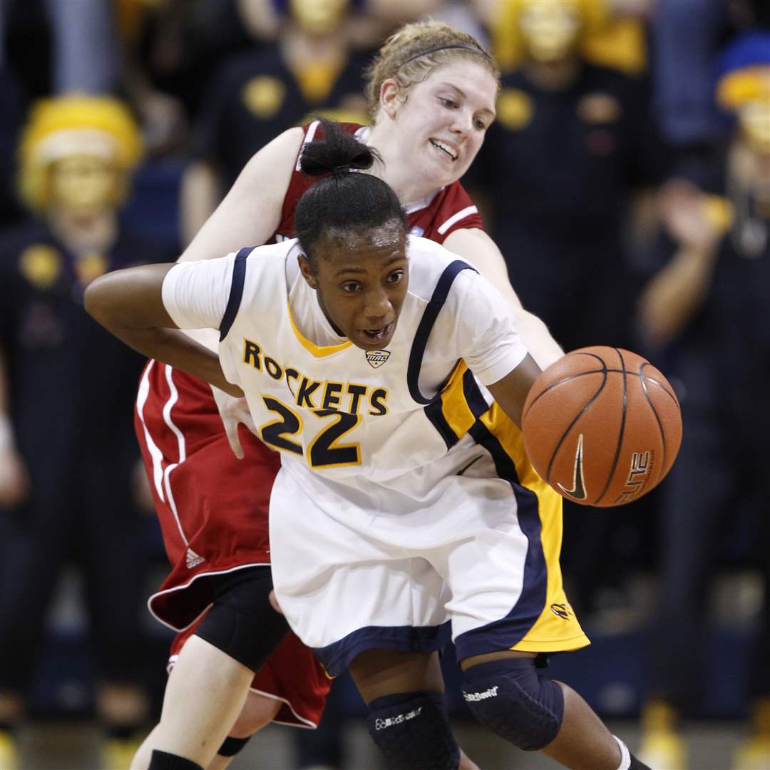 UTs-Andola-Dortch-is-fouled-by-NIU-s-Courtney-Shelton-in-the-second-half-Saturday
