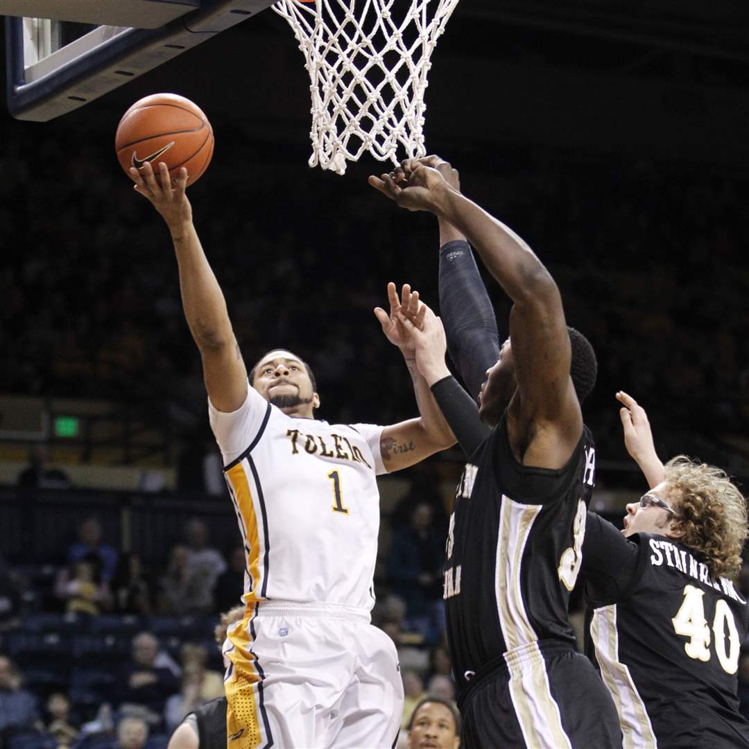University-of-Toledo-player-Dominique-Buckley-1-puts-up-a-shot-against-the-Western-Michigan-defense