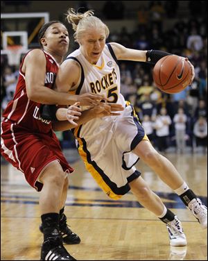 Toledo's Haylie Linn, drives inside against Northern Illinois' Alicia Johnson. The senior scored 14 points in what was likely her last game at Savage Arena. Linn had three 3-pointers to help the Rockets improve to 19-8 overall.