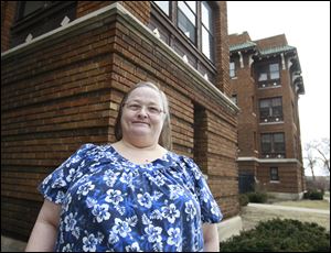 Mary Puckett didn’t go far when she left the Brand Whitlock
complex, her home for the last 20 years. She’s now in the Old West End’s Museum Place apartments, mainly because she wanted to stay close to her daughter.