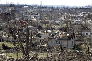 Debris from homes and trees litter the path of Friday's tornado in Henryville, Ind. on Saturday, March 3, 2012. Severe storms, predicted by forecasters for days, killed dozens of people in five states - Alabama, Georgia, Indiana, Kentucky and Ohio.