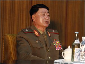 Kwak Chol Hui, deputy director of North Korea's National Defense Commission, attends a news conference Saturday in Pyongyang to discuss joint U.S.-South Korean war games that North Korea says threatens regional peace and stability.