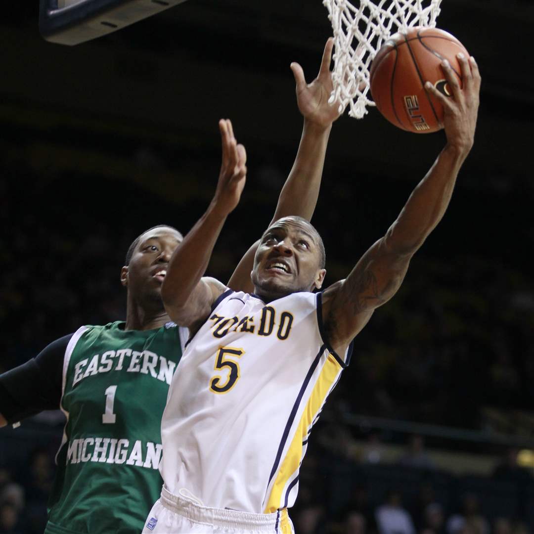 Toledos-Rian-Pearson-5-puts-up-a-shot-against-Eastern-Michigans-Da-Shonte-Riley