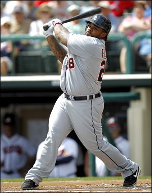 Detroit Tigers first baseman Prince Fielder swings at a pitch during a spring training baseball game against the Atlanta Braves, Saturday.