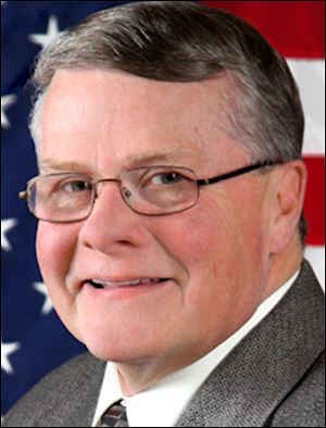 Tom Redmond.