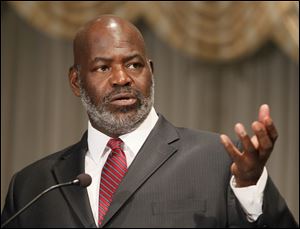 Mayor Mike Bell says the income tax 'is just too important' to the city's survival.