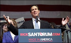 Republican presidential candidate and former Pennsylvania Sen. Rick Santorum speaks Tuesday at his election night rally at Steubenville High School in Steubenville, Ohio. 