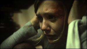Elizabeth Olsen is in almost every scene of 'Silent House.'